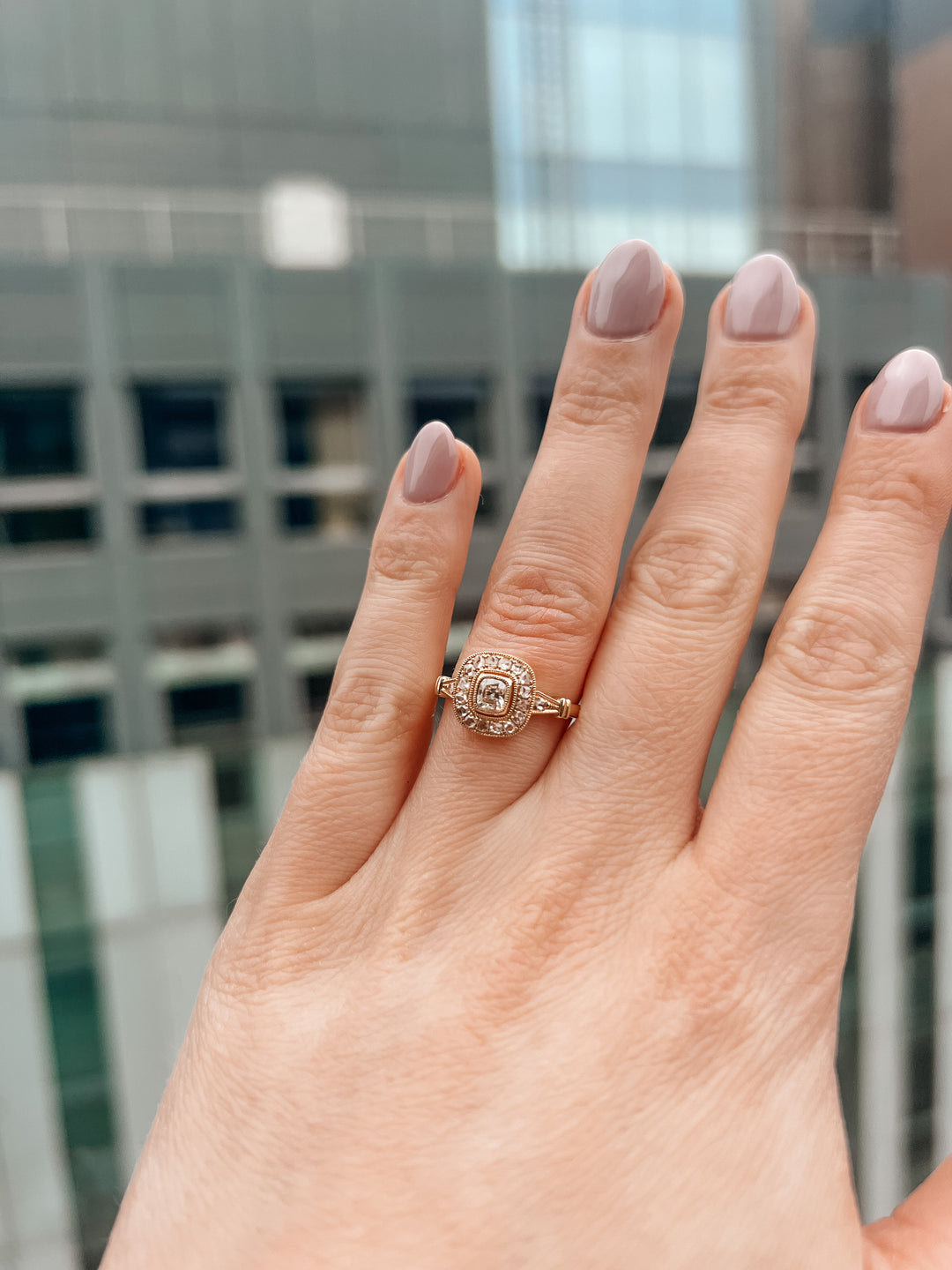 Antique cushion diamond ring