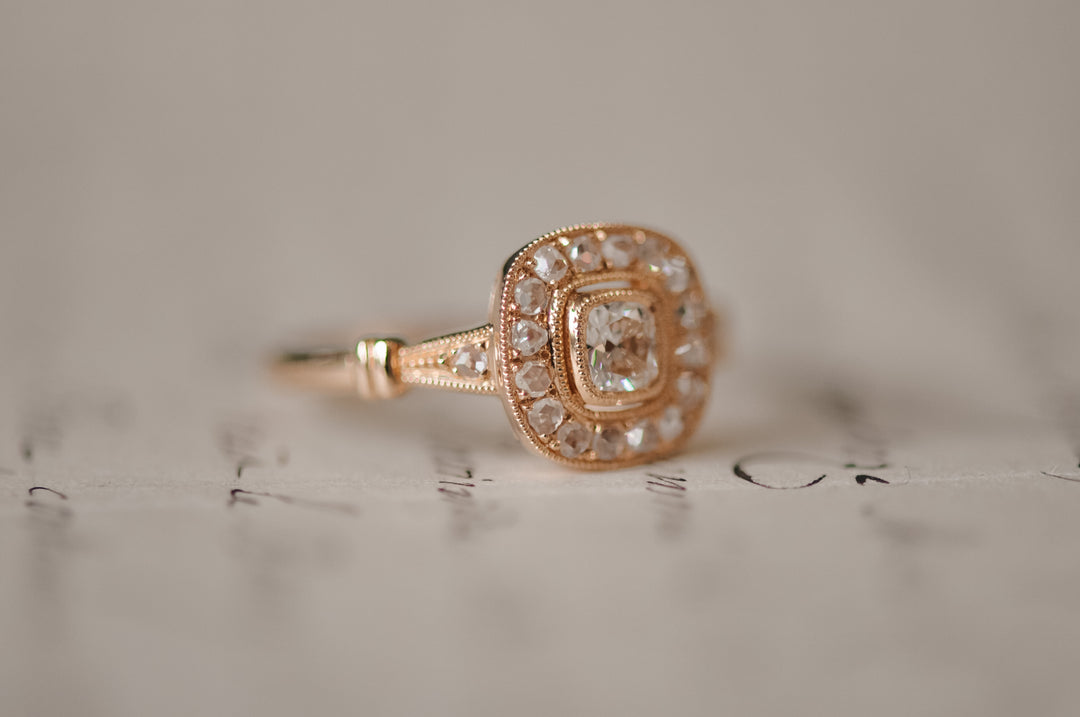 Antique cushion diamond ring