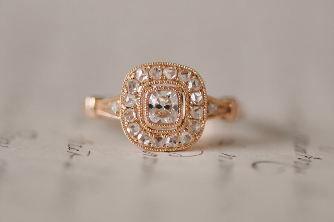 Antique cushion diamond ring