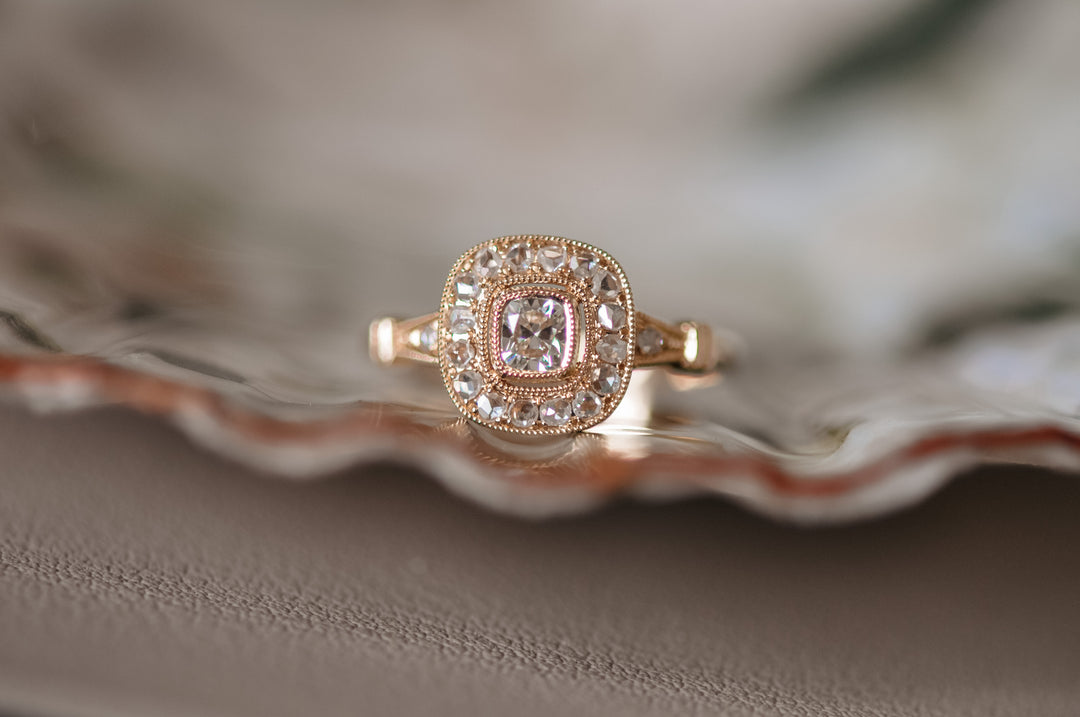 Antique cushion diamond ring