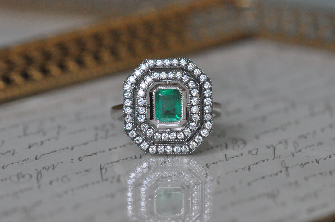 Antique emerald diamond ring